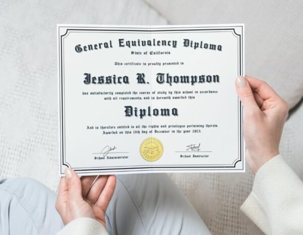 A proud graduate displaying a custom GED diploma certificate with a distinguished gold seal, celebrating academic achievement.