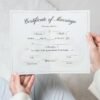 legant Marriage License Grasped by Young Woman
