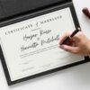 Fake virtual marriage certificate being officially signed in an elegant certificate holder
